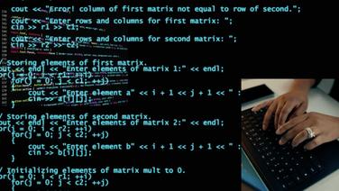 Multiple layers of the code of various programming languages with an image of hands typing on a laptop keyboard layered on top at the bottom right.
