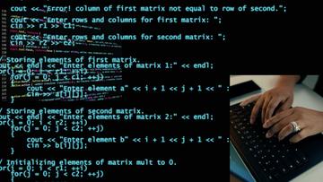 Multiple layers of the code of various programming languages with an image of hands typing on a laptop keyboard layered on top at the bottom right.